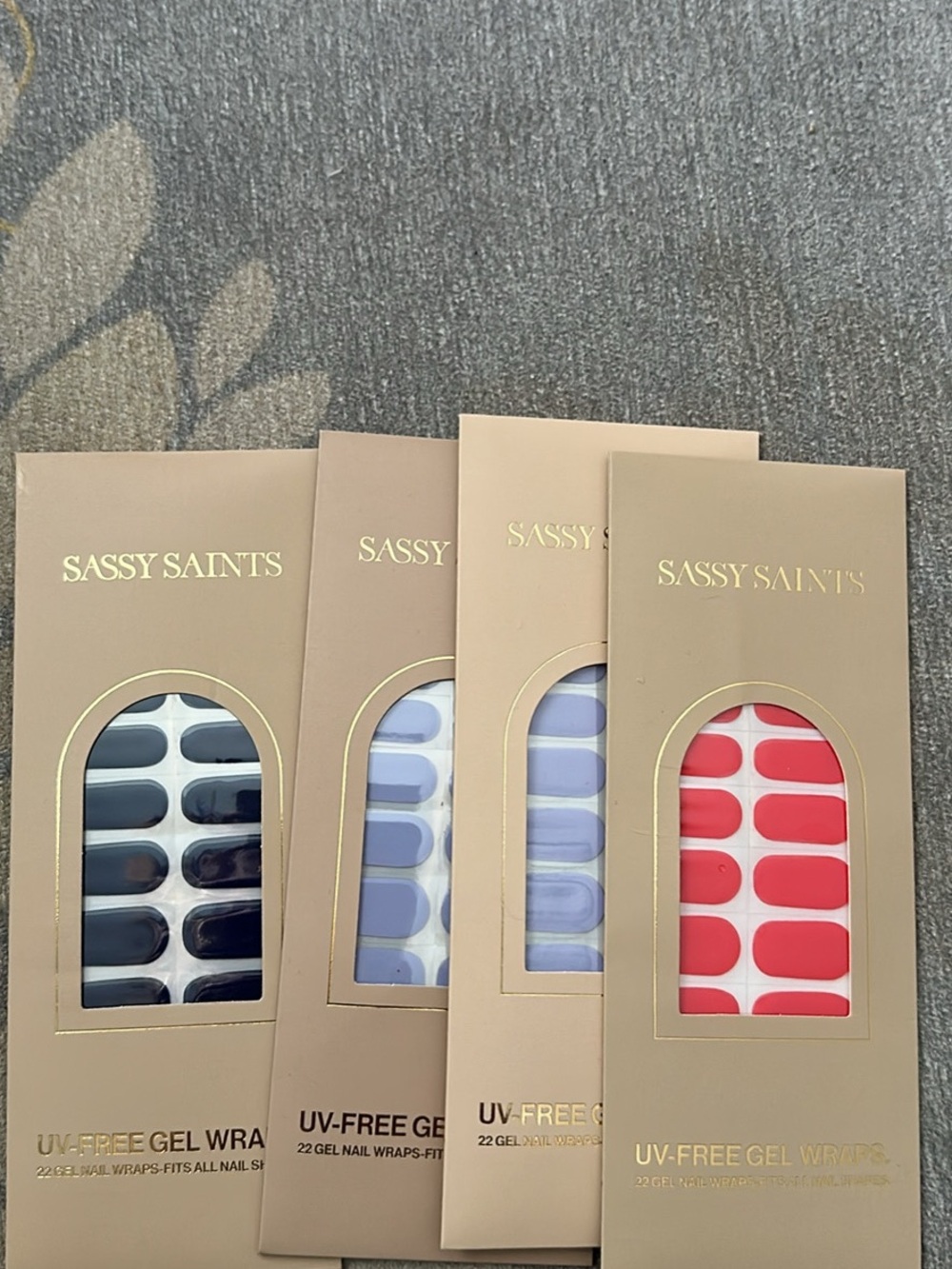 4 sets of Sassy Saints gel nail wraps